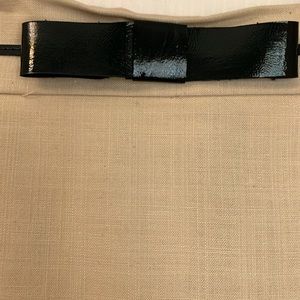Patent leather bow topped pencil skirt. Size 6.